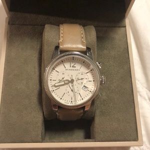 Burberry watch with leather strap.